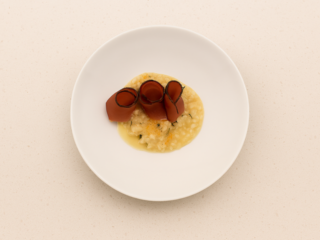 Risotto mit Südtiroler Apfel, Speck und Schüttelbrot